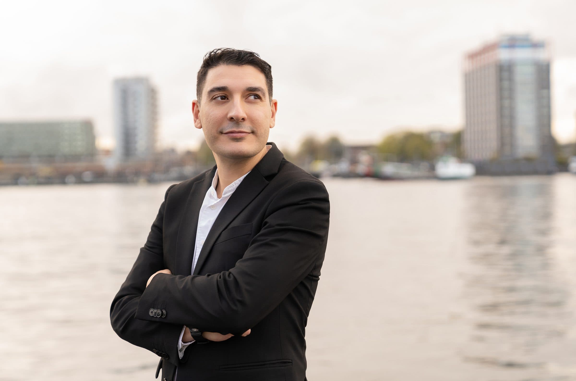 Luis Fernando Romero Calero by the water in Amsterdam